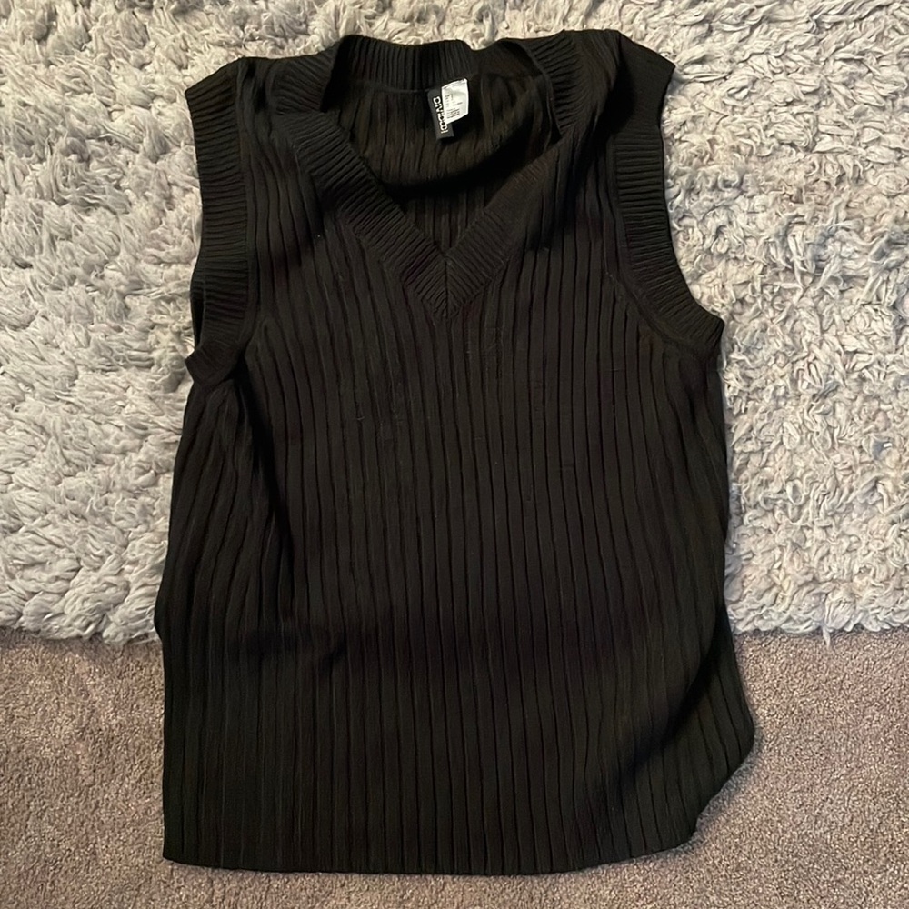 Black sweater vest